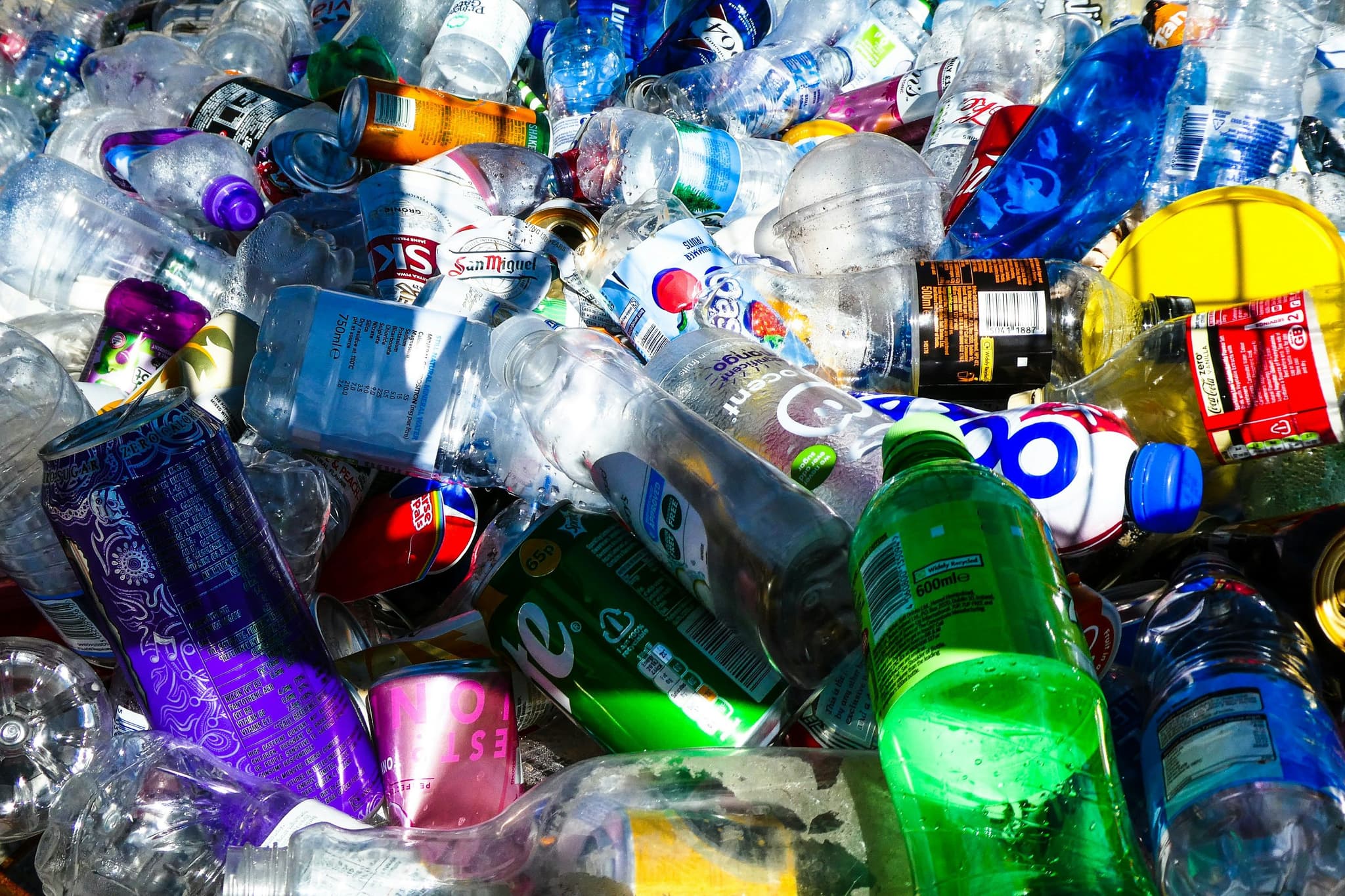 A recycling bin near Bournemouth beach.
Photo by Nick Fewings (@jannerboy62) on Unsplash. | WaterHub - Quota-based Water Refill Stations in Indonesia